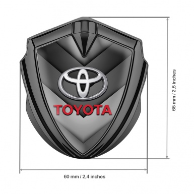 Toyota Trunk Emblem Badge Graphite Grey Arrows Red Characters Motif