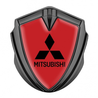Mitsubishi Fender Emblem Badge Graphite Red Background Black Logo Motif