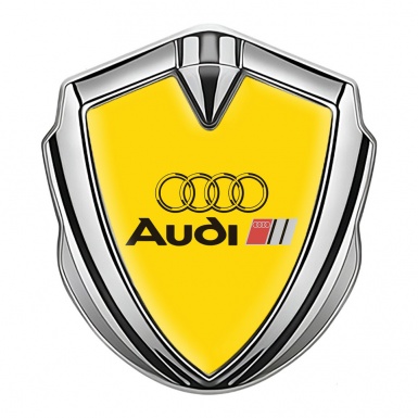 Audi Fender Emblem Badge Silver Yellow Background Black Logo Design