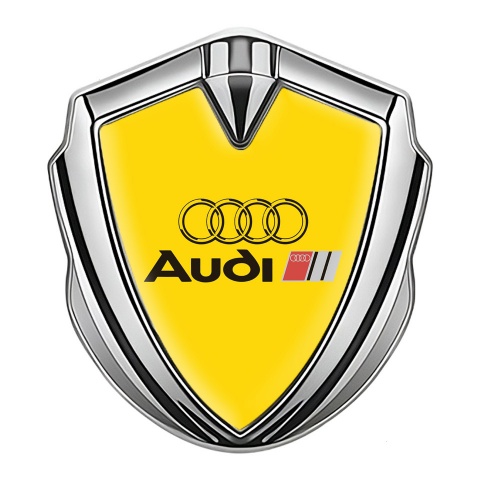 Audi Fender Emblem Badge Silver Yellow Background Black Logo Design