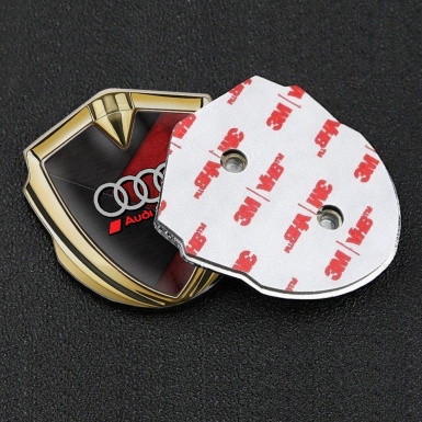 Audi Bodyside Emblem Badge Gold Red Stone Surface Sport Rings