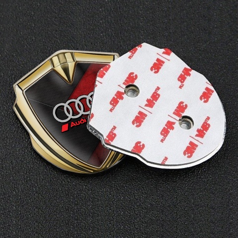 Audi Bodyside Emblem Badge Gold Red Stone Surface Sport Rings