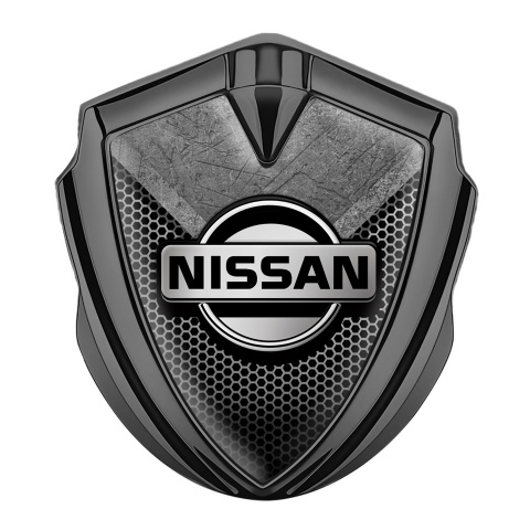 Nissan Bodyside Domed Emblem Graphite Hexagon Texture Stone Fragment
