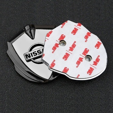 Nissan Fender Emblem Badge Graphite Grey Background Metallic Logo