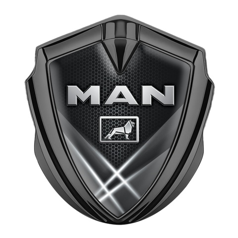 MAN Domed Emblem Graphite Grey Hexagon Texture Light Beams Effect