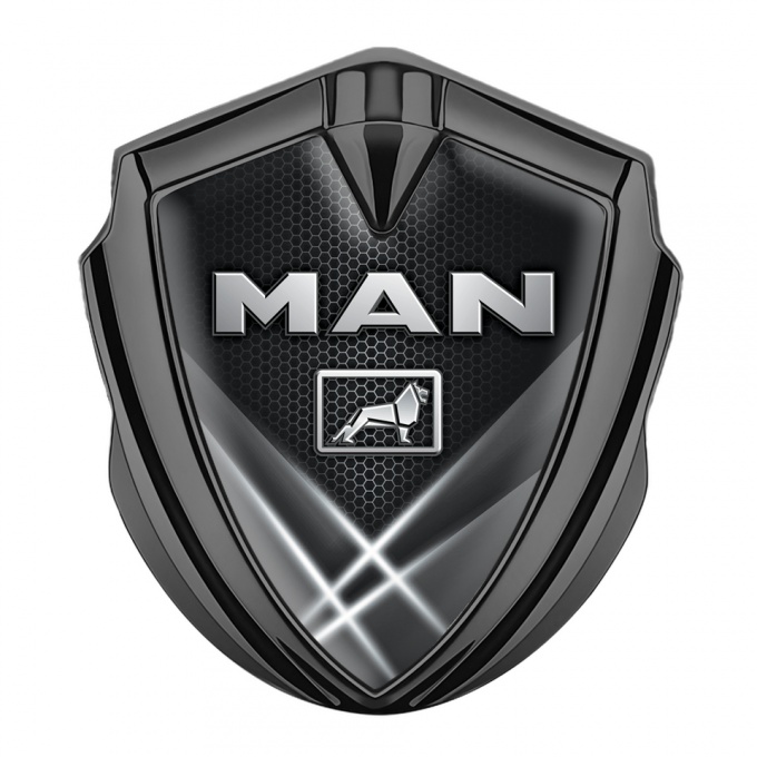 MAN Domed Emblem Graphite Grey Hexagon Texture Light Beams Effect