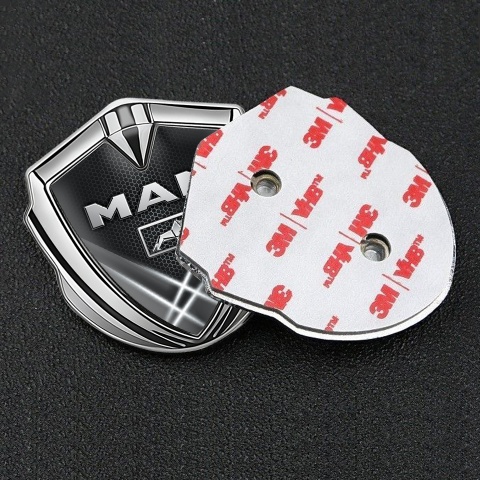 MAN Domed Emblem Silver Grey Hexagon Texture Light Beams Effect