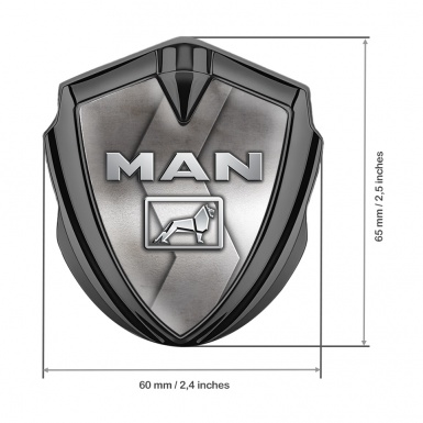 MAN Metal Domed Emblem Graphite Abrasive Texture Steel Color Logo