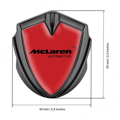 Mclaren Metal Domed Emblem Graphite Crimson Background Classic Logo